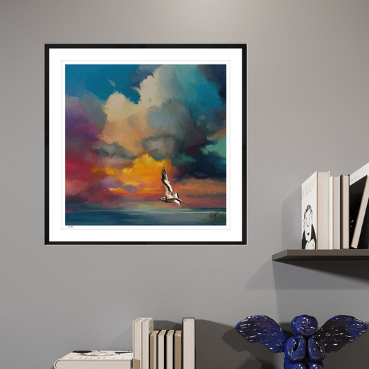 Golden Sunset wildlife art black framed open edition print by Natalie Jump. A solitary seagull glides effortlessly across the surface of a calm, glass like sea.