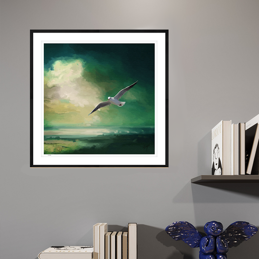 Glide wildlife art black framed open edition print by Natalie Jump. A lone seagull glides effortlessly across a deep sea green sky. Open Edition wildlife artwork on premium fine art paper. 