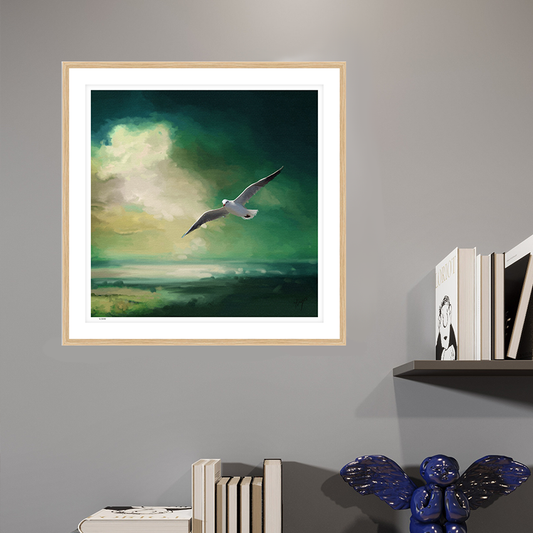 Glide wildlife art oak framed open edition print by Natalie Jump. A lone seagull glides effortlessly across a deep sea green sky. Open Edition wildlife artwork on premium fine art paper. 
