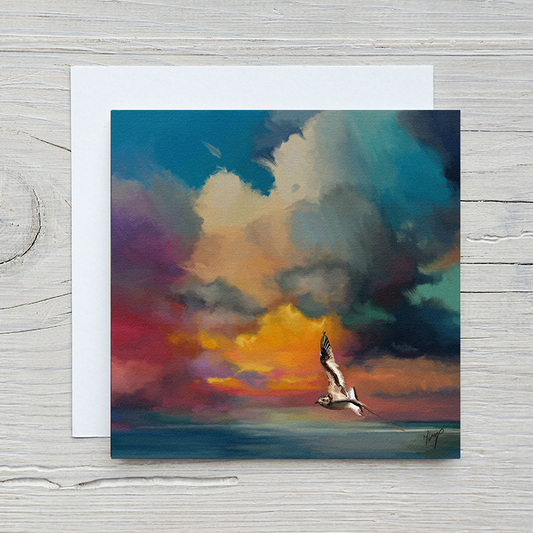 Golden Sunset wildlife art greetings card print by Natalie Jump. A solitary seagull glides effortlessly across the surface of a calm, glass like sea.
