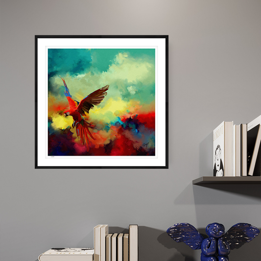 Tropical Drift wildlife art black framed open edition print by Natalie Jump. A vibrant explosion of colour and motion, a macaw is captured mid-flight, its wings extended in a burst of reds, golds and electric blues. 