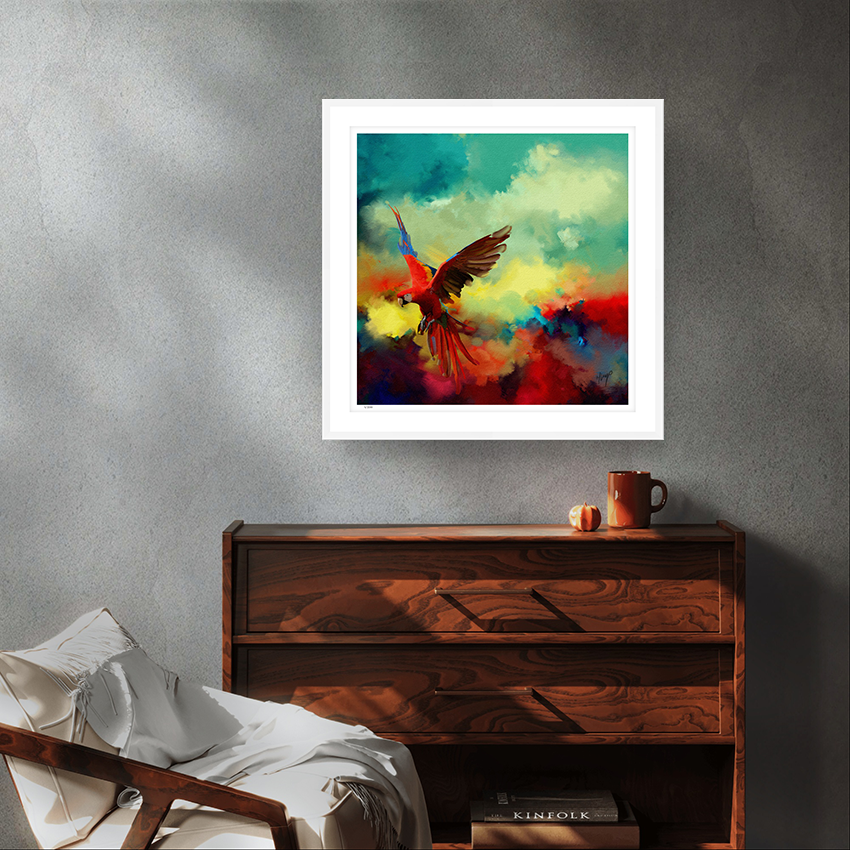 Tropical Drift wildlife white framed limited edition art print by Natalie Jump. A vibrant explosion of colour and motion, a macaw is captured mid-flight, its wings extended in a burst of reds, golds and electric blues. 